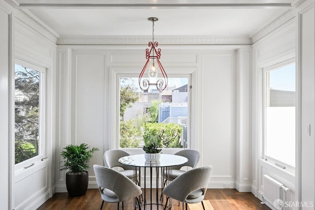 2500 Steiner St Unit 3, San Francisco, CA 94115 - dining room featuring radiator, dark wood finished floors, and a decorative wall