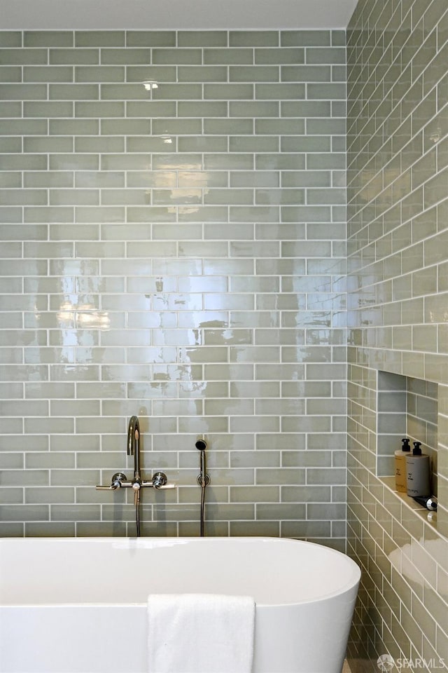 2500 Steiner St Unit 3, San Francisco, CA 94115 - full bathroom featuring a freestanding tub and tile walls