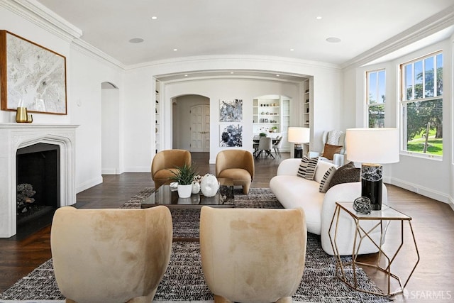 2500 Steiner St Unit 3, San Francisco, CA 94115 - living area with arched walkways, built in features, crown molding, a fireplace, and wood finished floors