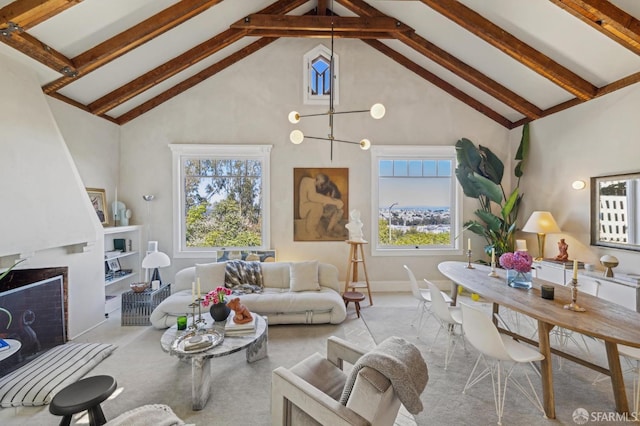 living area featuring plenty of natural light, beamed ceiling, a fireplace, and high vaulted ceiling