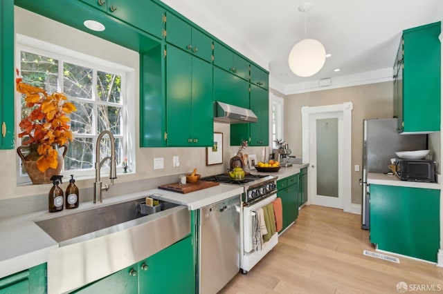 kitchen with a sink, gas range oven, dishwasher, exhaust hood, and light wood-type flooring