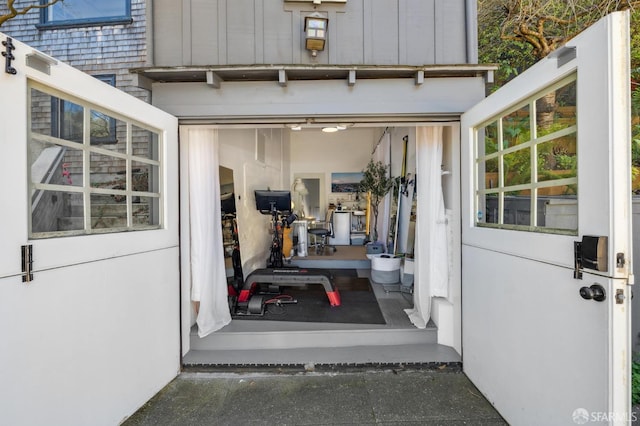 exterior space with stucco siding and board and batten siding