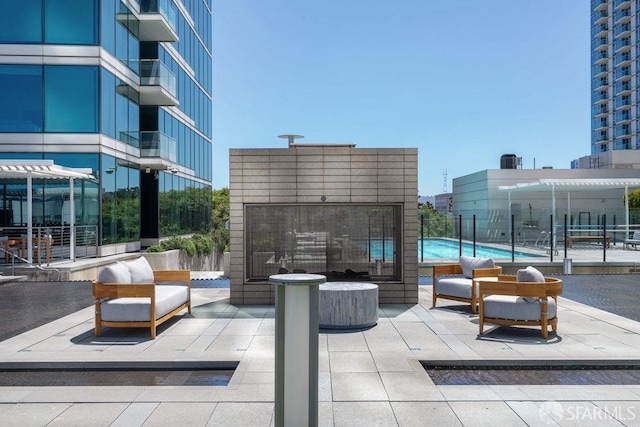 view of patio with a community pool