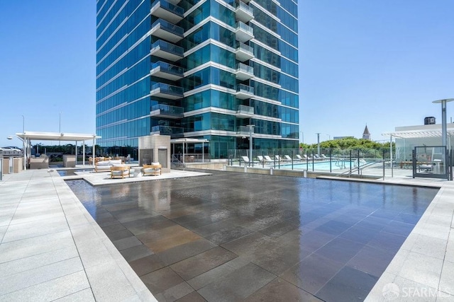 view of swimming pool featuring a patio