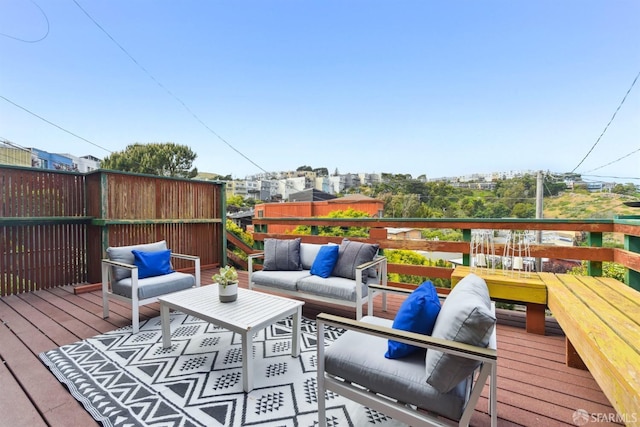 wooden deck featuring an outdoor living space