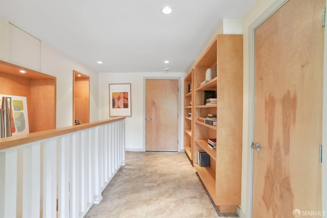 corridor with recessed lighting