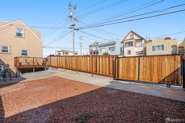 view of yard with a wooden deck