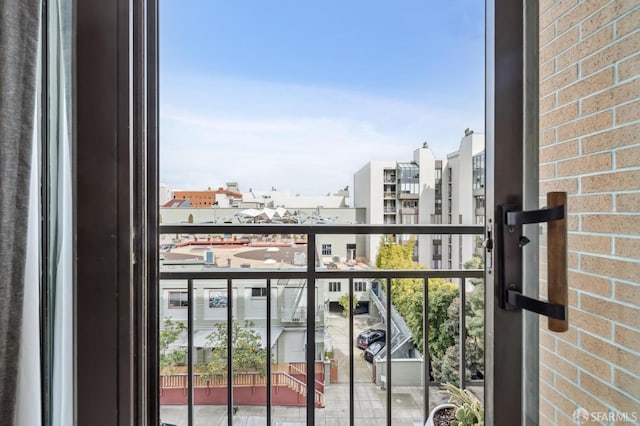 balcony featuring a view of city