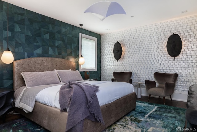 bedroom with dark wood-type flooring