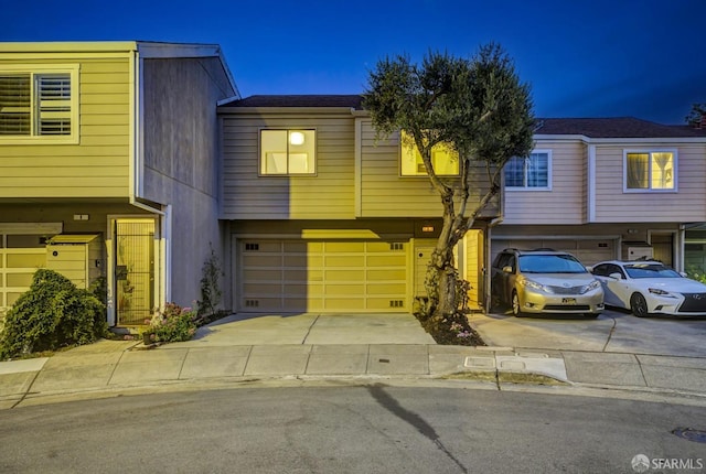 view of front of property with a garage