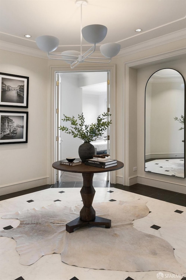 unfurnished dining area with ornamental molding