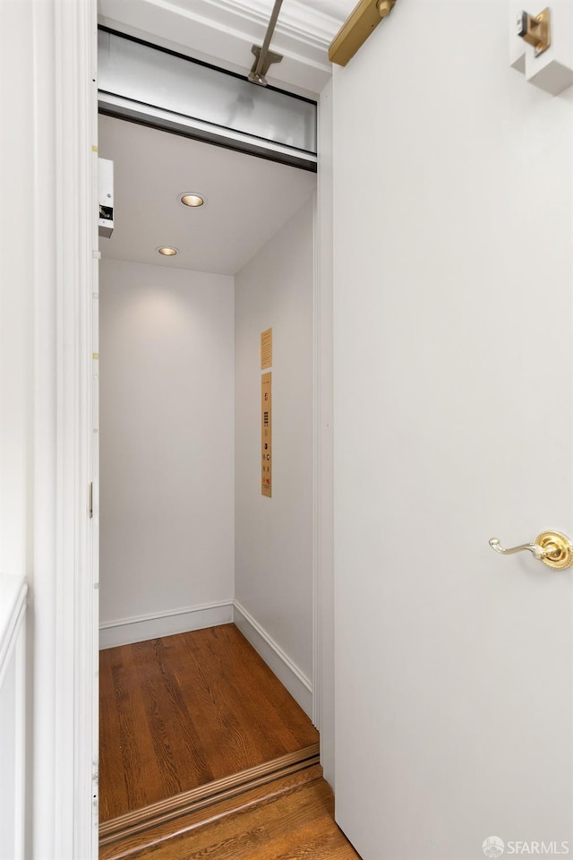 spacious closet featuring hardwood / wood-style floors