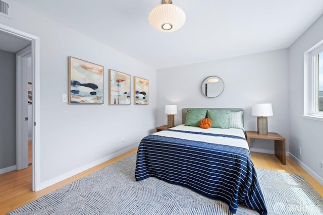 3421 25th St Unit 4, San Francisco, CA 94110 - bedroom with wood finished floors and baseboards