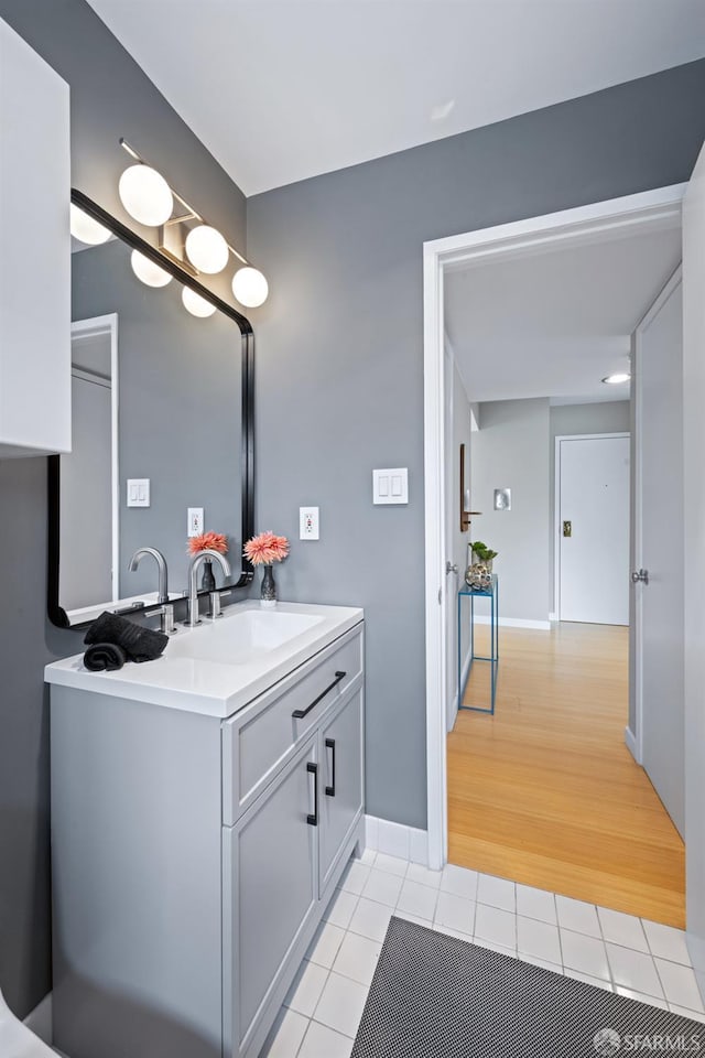 3421 25th St Unit 4, San Francisco, CA 94110 - bathroom with tile patterned floors and vanity
