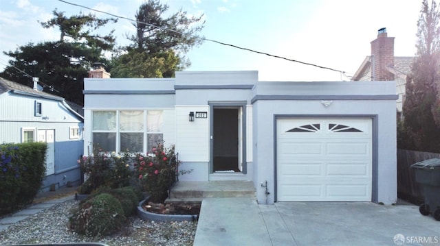 view of front of home featuring a garage