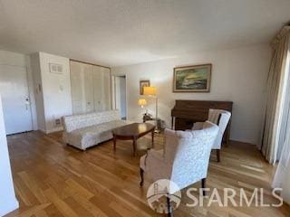 800 N Delaware St Unit 211, San Mateo, CA 94401 - living area featuring wood finished floors