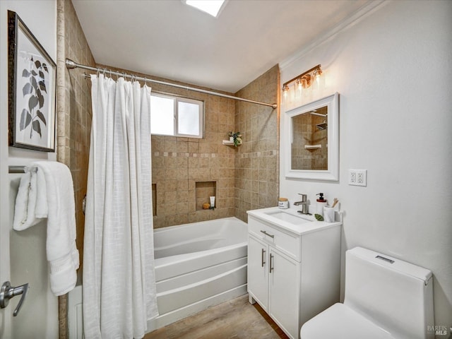 full bathroom featuring vanity, shower / tub combo with curtain, and toilet