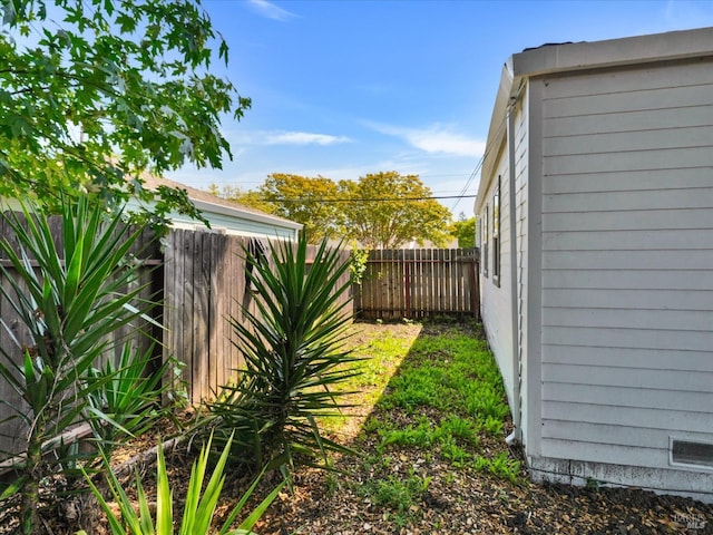 view of yard with fence