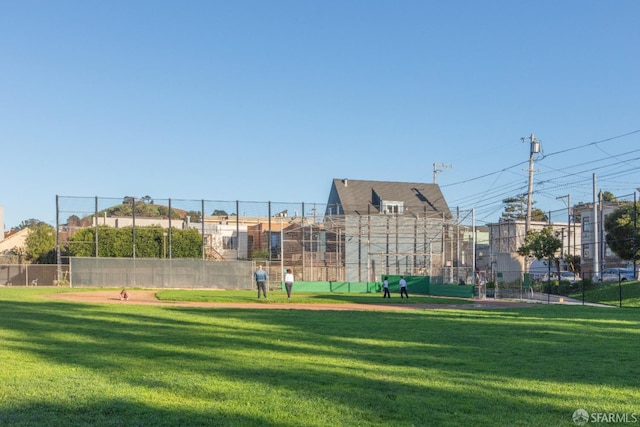 view of property's community with a yard