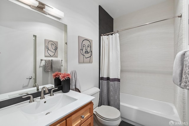 full bathroom featuring vanity, shower / tub combo, and toilet