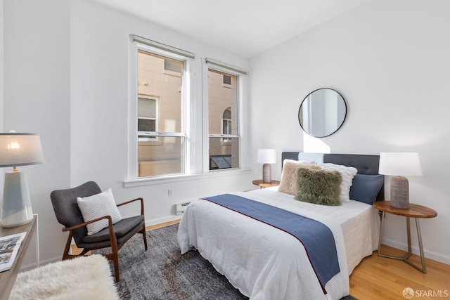 bedroom featuring hardwood / wood-style flooring