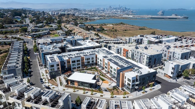 bird's eye view with a water view and a city view