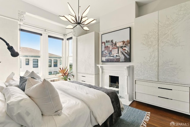370 Sanchez St, San Francisco, CA 94114 - bedroom featuring a chandelier, dark wood finished floors, and a premium fireplace