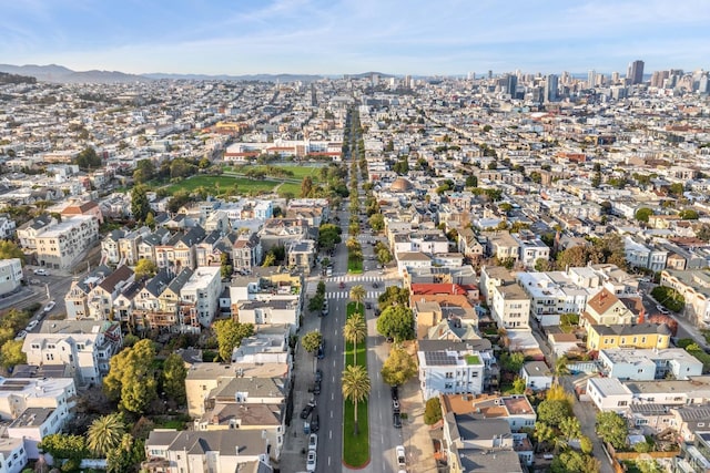 birds eye view of property with a residential view