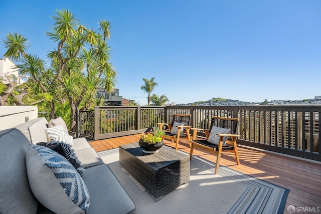 deck featuring outdoor lounge area