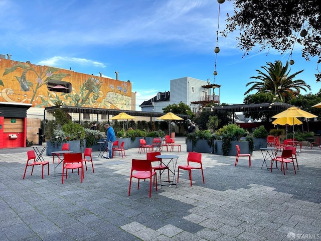 surrounding community with a patio