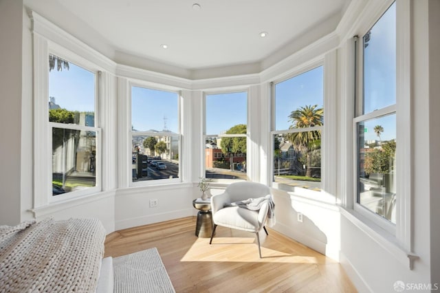 sunroom / solarium featuring a healthy amount of sunlight