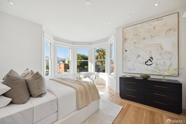 bedroom featuring light wood-type flooring