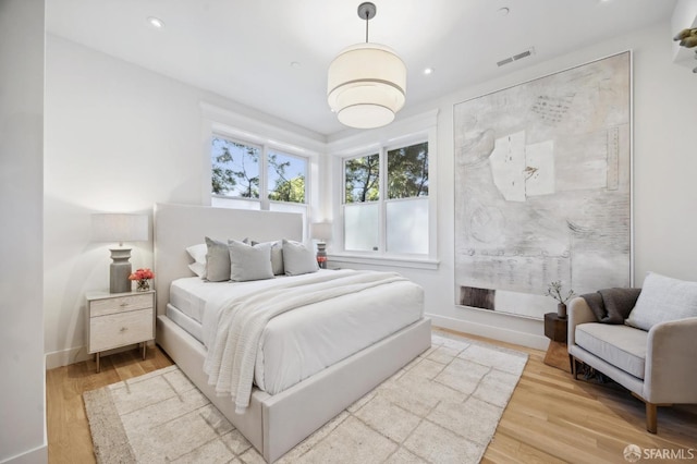 bedroom featuring light wood-type flooring