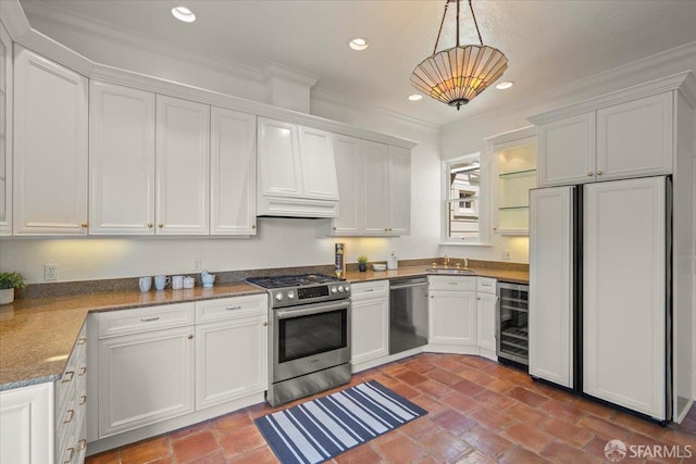 787 Arguello Blvd, San Francisco, CA 94118 - kitchen featuring appliances with stainless steel finishes, wine cooler, a sink, white cabinetry, and ornamental molding