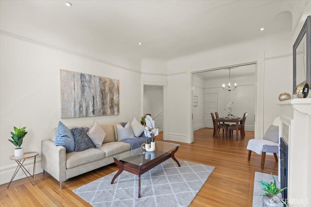787 Arguello Blvd, San Francisco, CA 94118 - living area featuring light wood-type flooring, a chandelier, recessed lighting, and baseboards