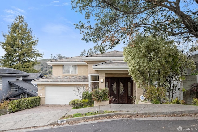 view of front of house with a garage