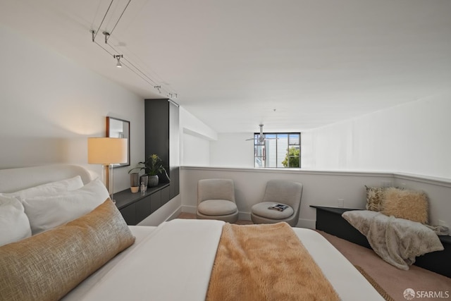 39 Boardman Pl Unit 105, San Francisco, CA 94103 - bedroom featuring baseboards and rail lighting