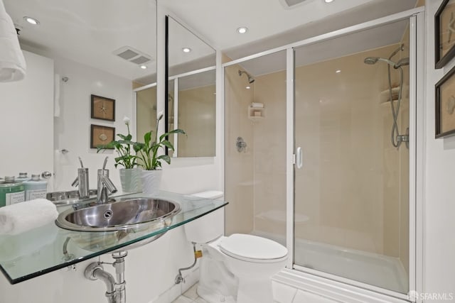 39 Boardman Pl Unit 105, San Francisco, CA 94103 - full bath featuring a stall shower, vanity, recessed lighting, and tile patterned floors