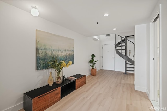 39 Boardman Pl Unit 105, San Francisco, CA 94103 - corridor featuring wood finished floors, stairs, and recessed lighting