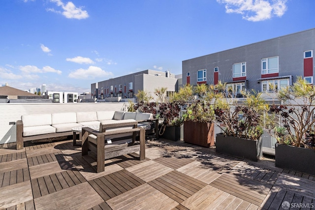 deck featuring outdoor lounge area