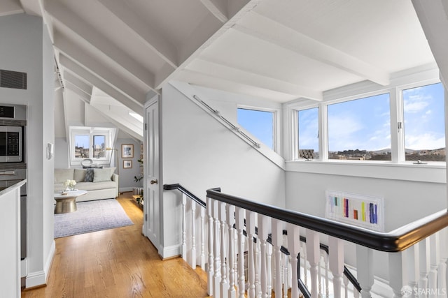 3294 Clay St Unit 6, San Francisco, CA 94123 - hallway with light wood-style floors and beam ceiling