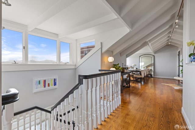 3294 Clay St Unit 6, San Francisco, CA 94123 - corridor with beam ceiling, wood finished floors, and an upstairs landing