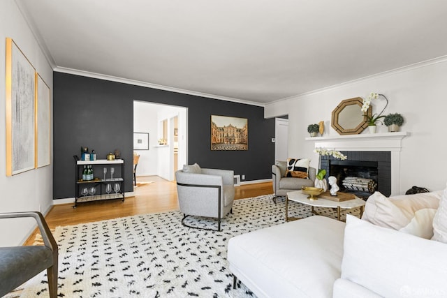 126 Scott St, San Francisco, CA 94117 - living area featuring crown molding, wood finished floors, a fireplace, and baseboards