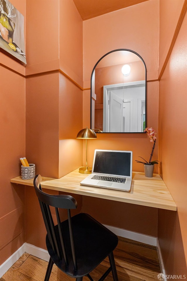 126 Scott St, San Francisco, CA 94117 - home office with built in desk, baseboards, and wood finished floors