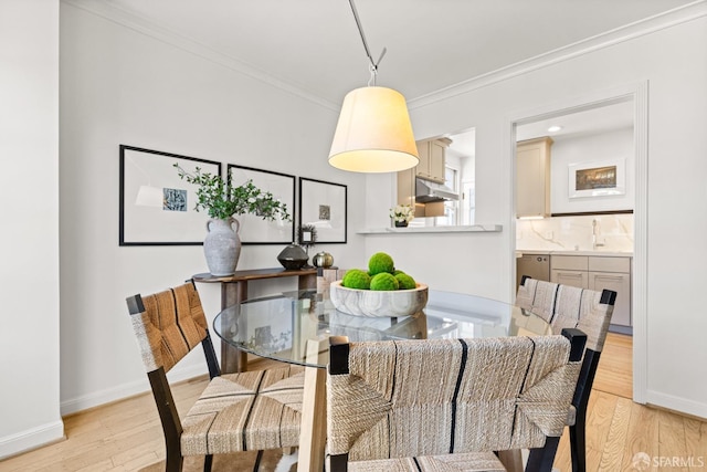 126 Scott St, San Francisco, CA 94117 - dining room with light wood finished floors, ornamental molding, and baseboards