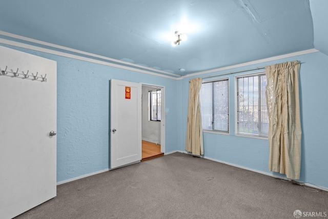 unfurnished bedroom with carpet