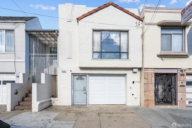 view of property featuring a garage