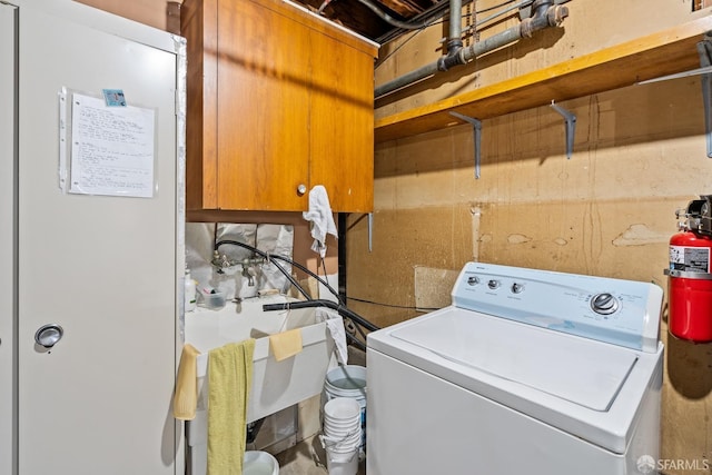 laundry room with washer / dryer