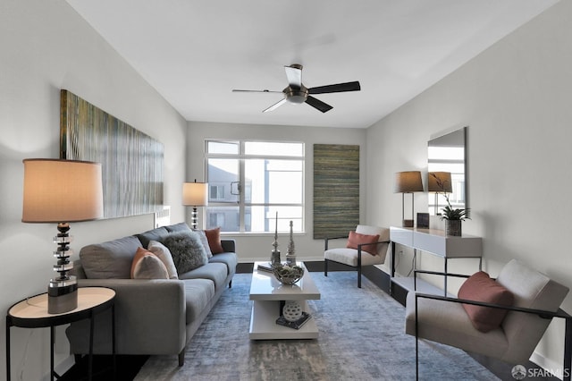 living room featuring hardwood / wood-style flooring and ceiling fan