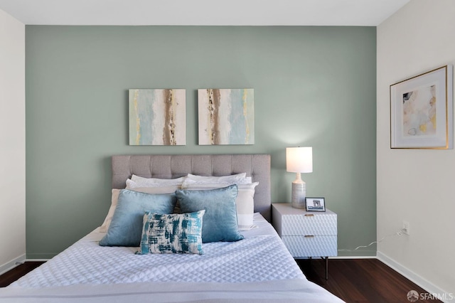 bedroom featuring dark wood-type flooring